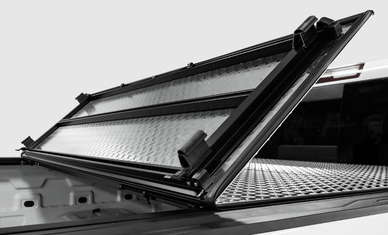 Access LOMAX Tri-Fold Cover 22-26 Toyota Tundra 5Ft./6in. Bed w/ deck rail - Matte Black